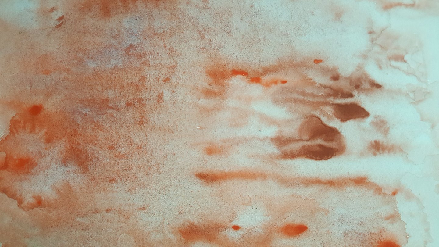 Abstrakte Aquarellverläufe in gebranntem Orange und Blaugrün.